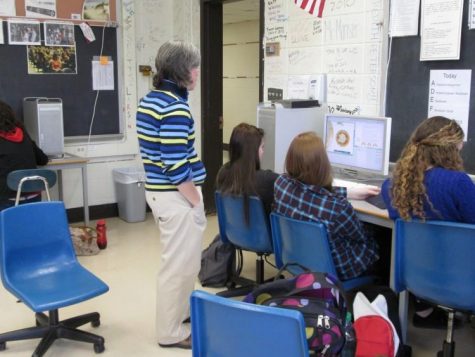 Mrs. Corbett helping out some students.