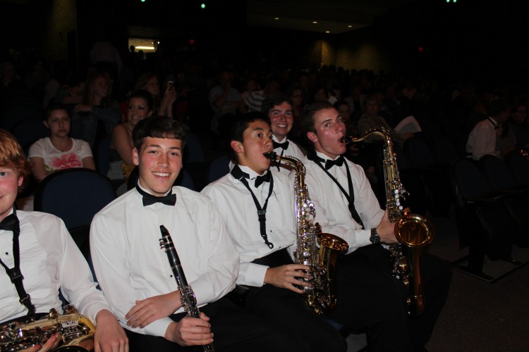 Members of the Morgan Band sitting front row. From left to right: Michael Van Ness, Ethan Paradis, Jonathon Chann, Patrick McAllister, and Jonathan Markovics