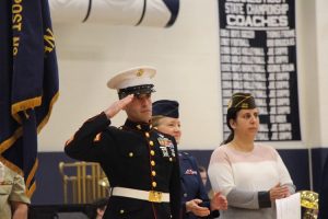 A veteran saluting