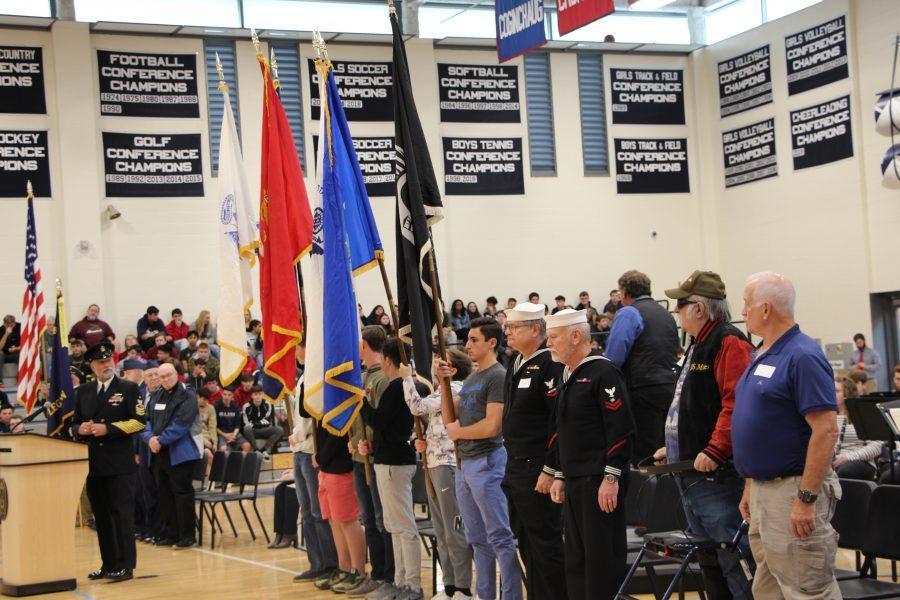 Students of Morgan holding the flags