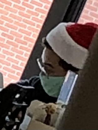 Sneak Shot of Mr. Melendez and his Santa hat