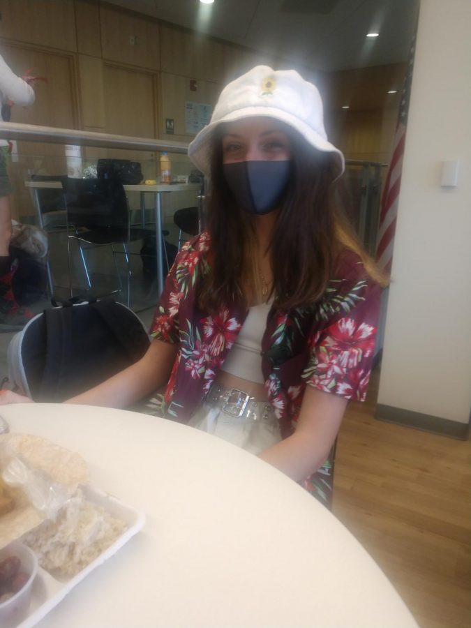 A student dressed as a tacky tourist at lunch!