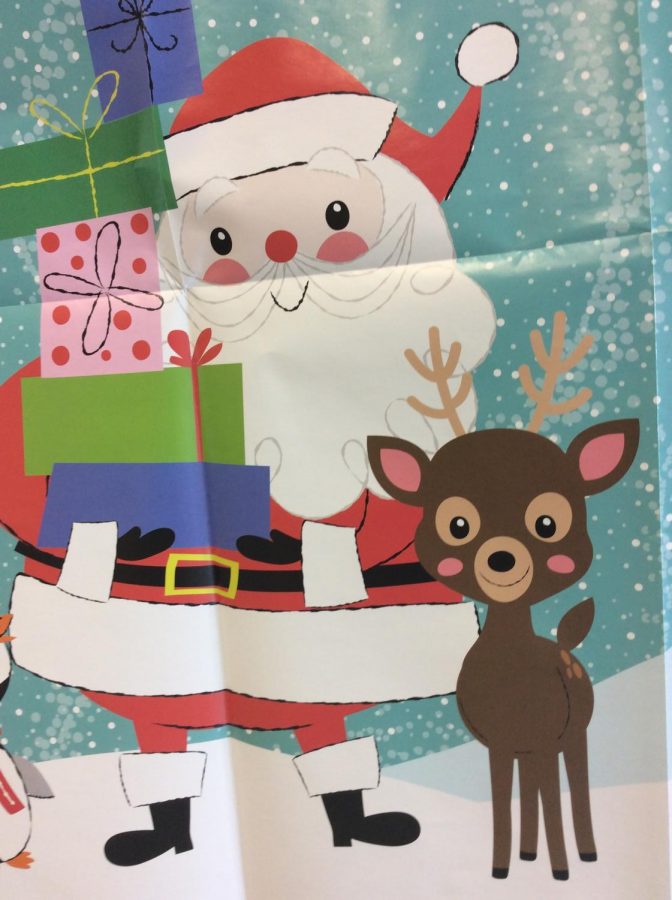 A sign with Santa and a reindeer