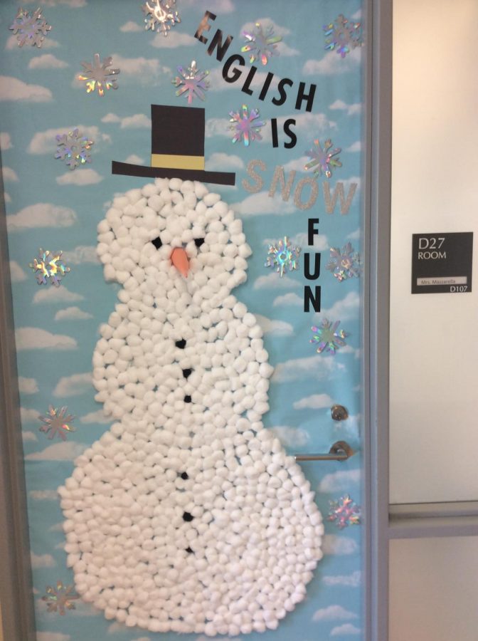 A decorated door with a snowman