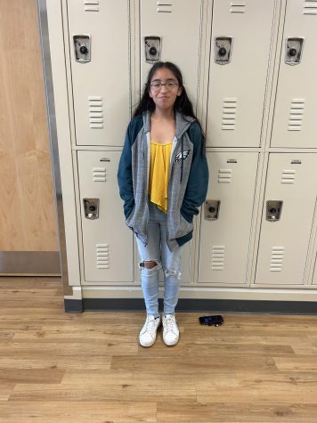 Giovanna Riera-Bautista in front of her locker