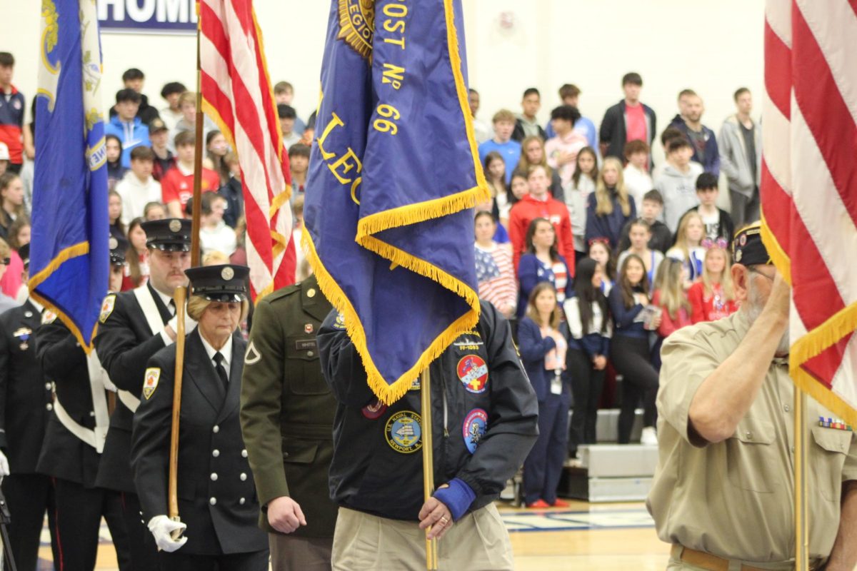 Veterans holding the flag