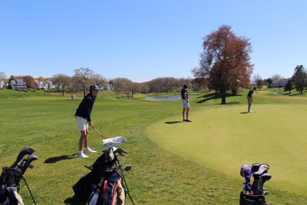 Golf team playing at TPC River Highland 