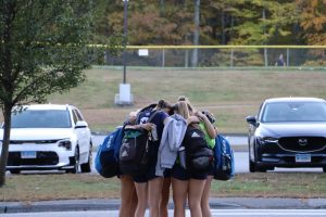 Morgan girls soccer seniors hugging