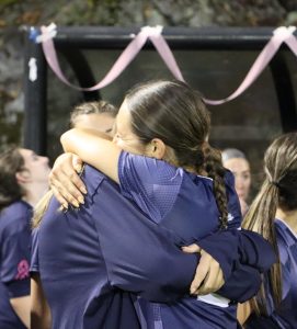 Gabi Navarra and Riley Febbroriello hugging