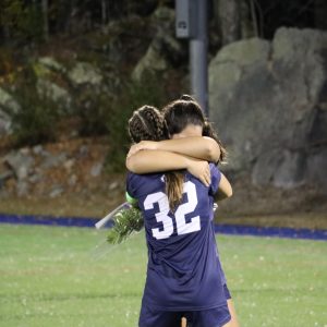 Nora Winsor and Rachel Spaziano hugging