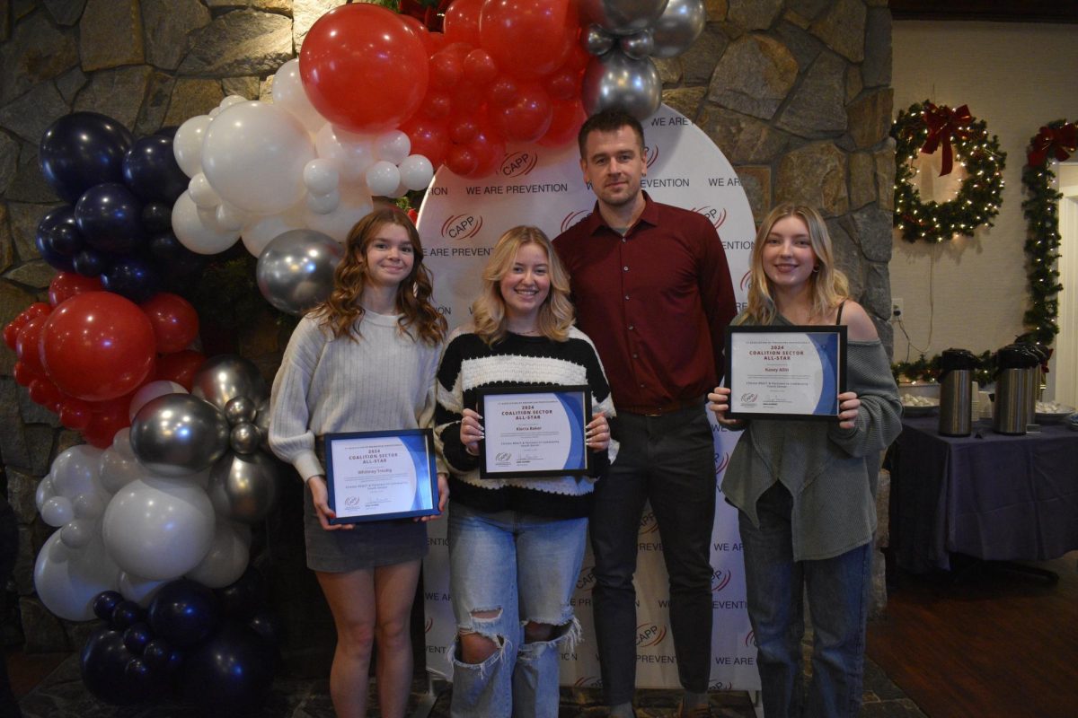 Whittney Truebig (11), Kierra Baker (12), and Kasey Allin (12) recieving All-Star Award.