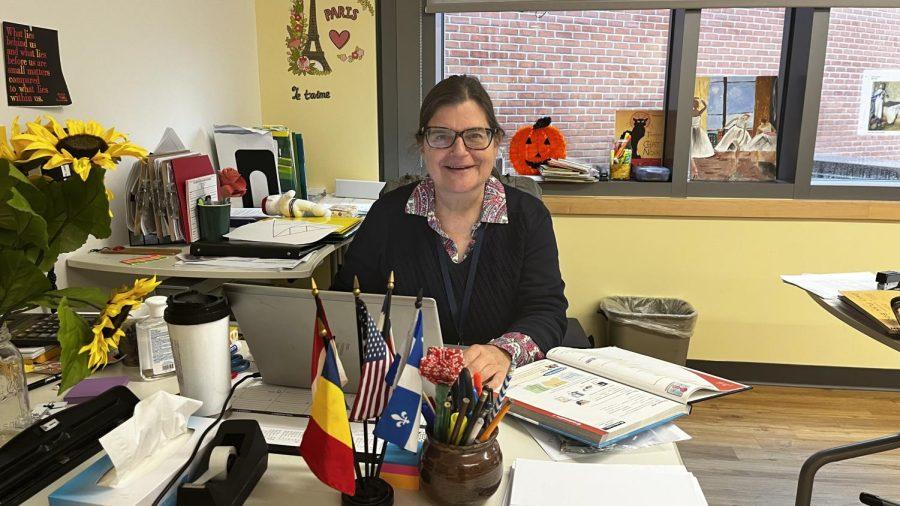 Madame at her desk
