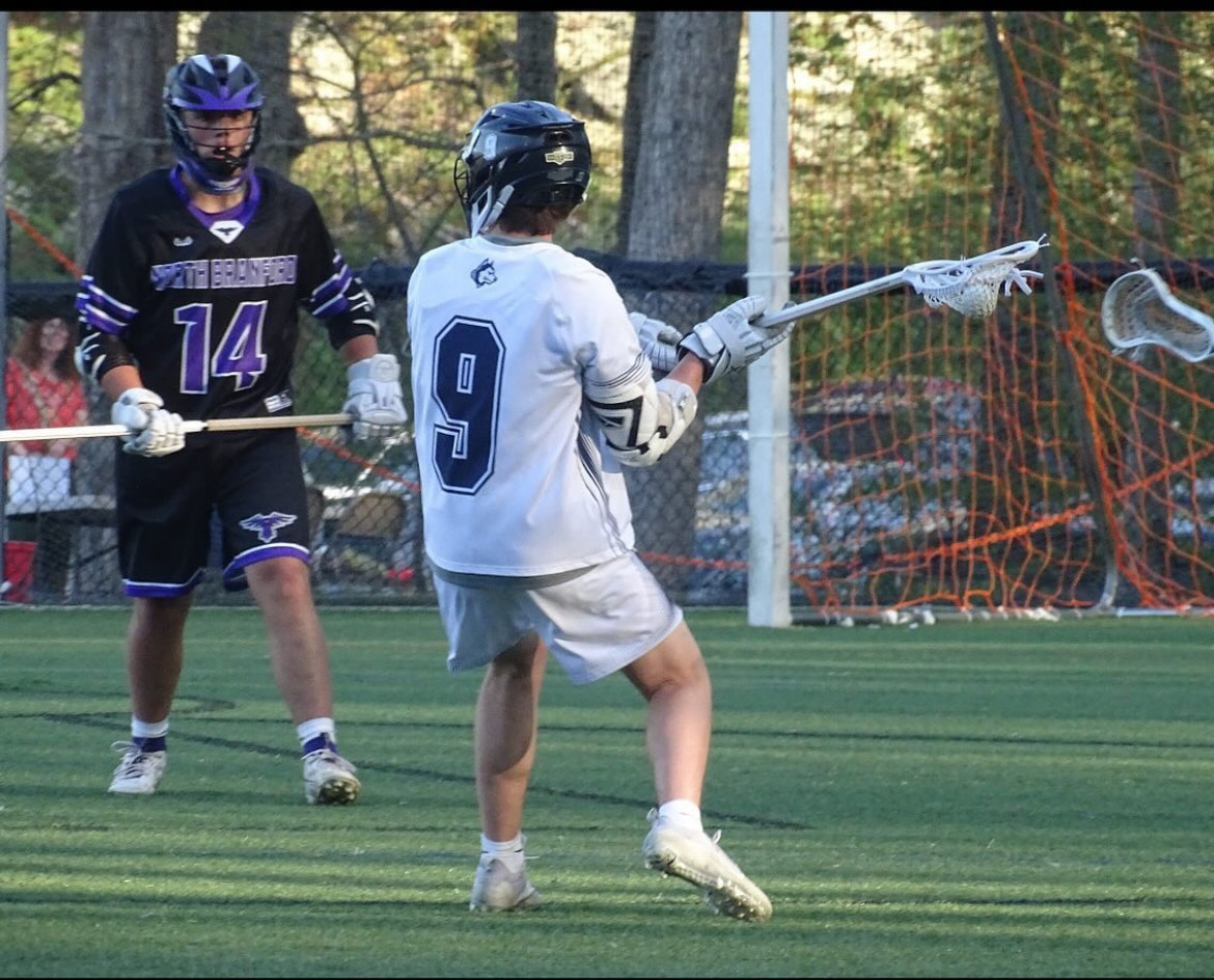 Jake L playing lacrosse 