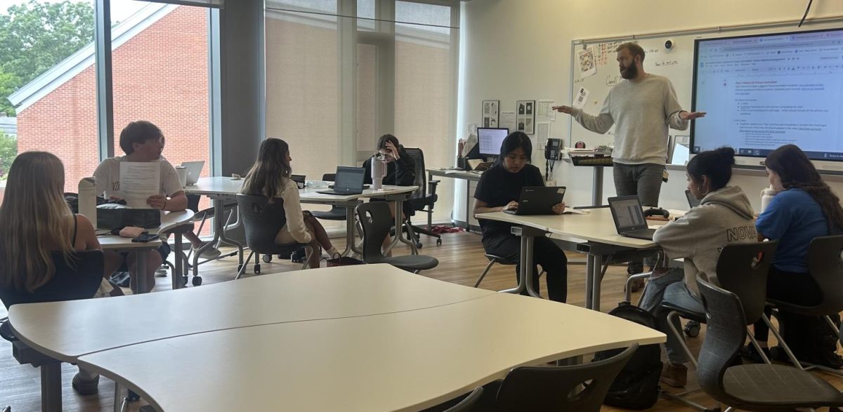Mr. Carroll teaching journalism students 