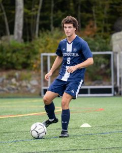 Captain Colton Landino playing soccer