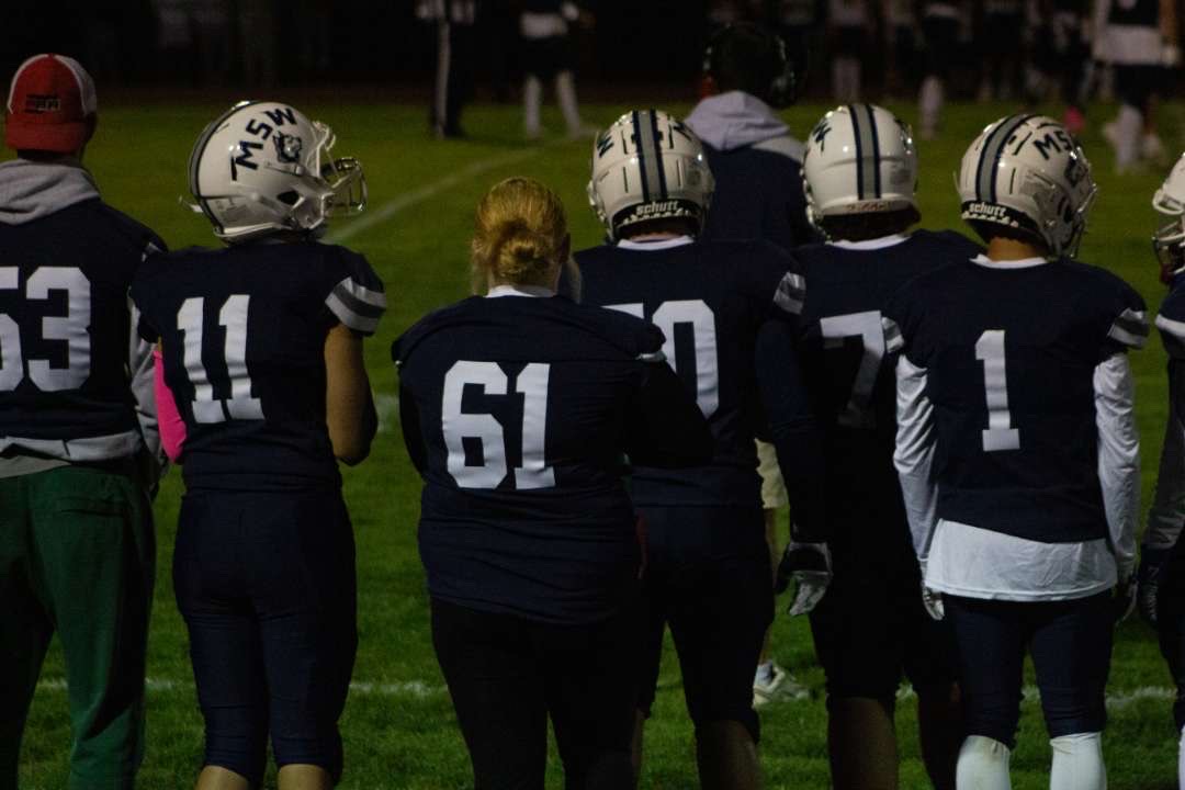 Huckabey encouraging her teammates on the sidelines as MSW plays HK