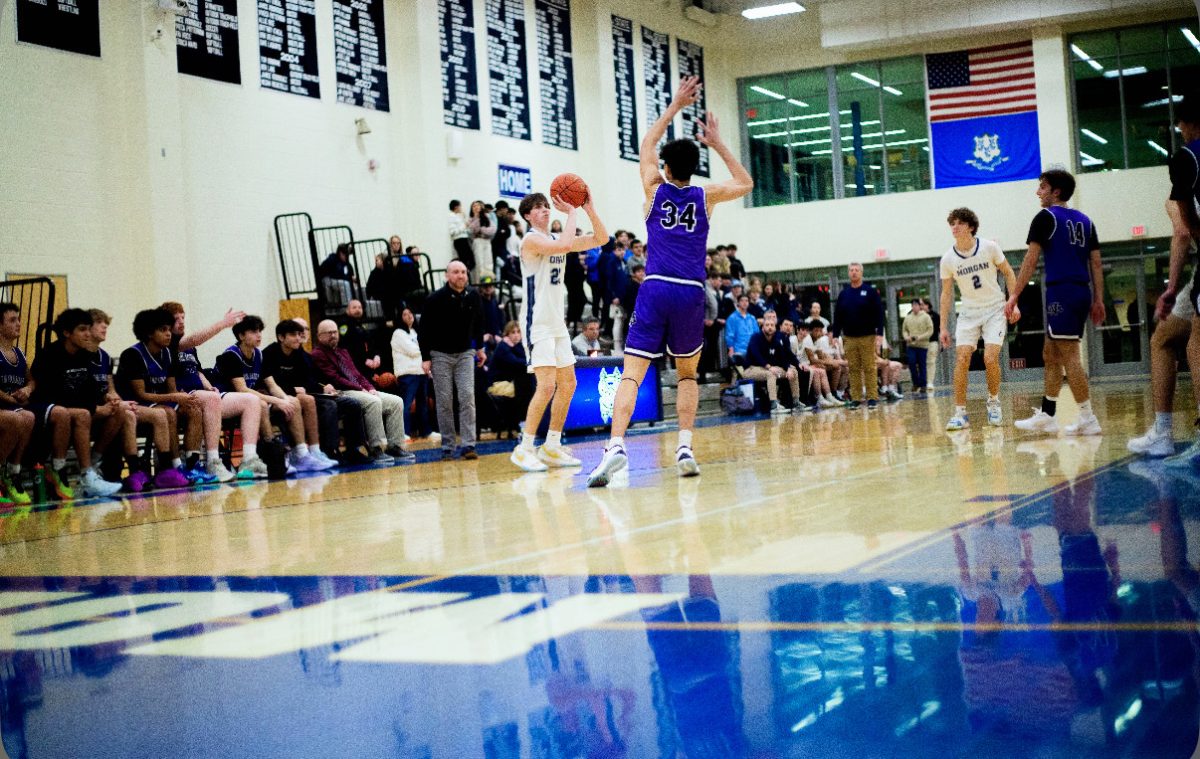 Michael Dwake shooting a three pointer.