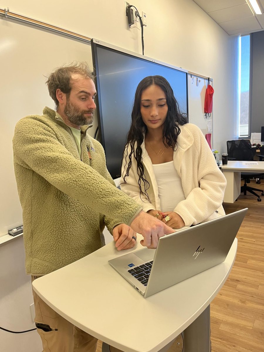 Mr. Richetelli helping a student