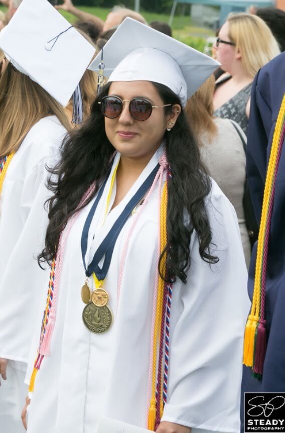Mrs. Rivadeneira graduating alongside her class, the Class of 2017