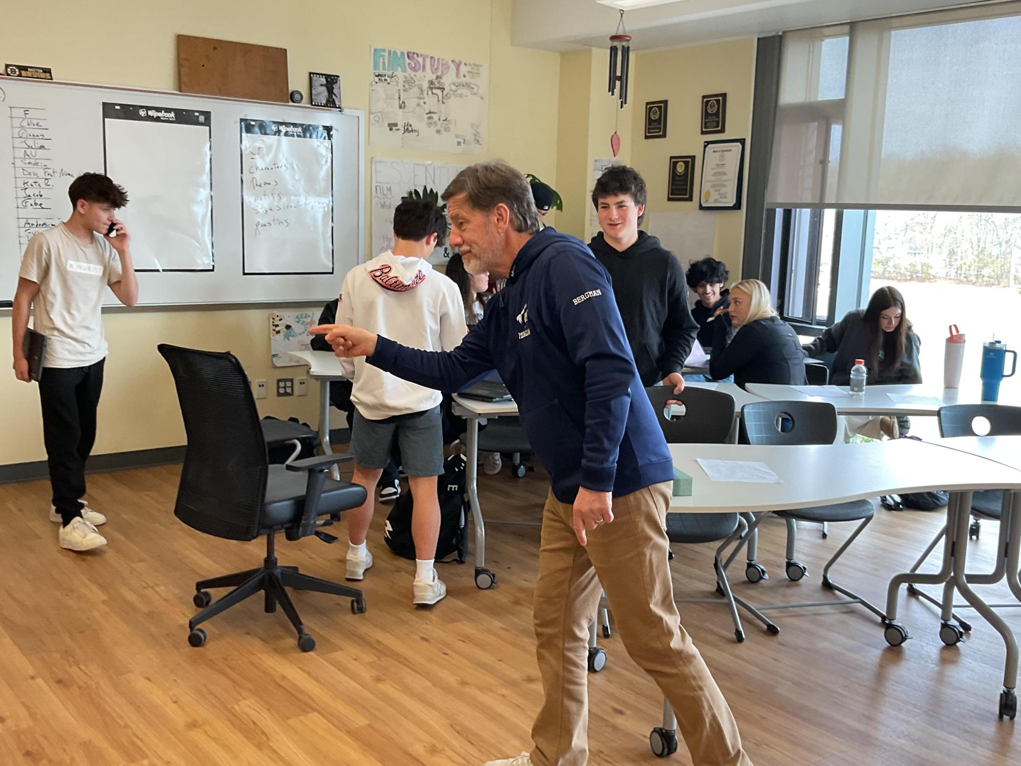 Mr. Bergman calling on a student.