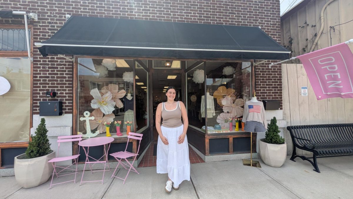 Lily Megelio outsite of her store