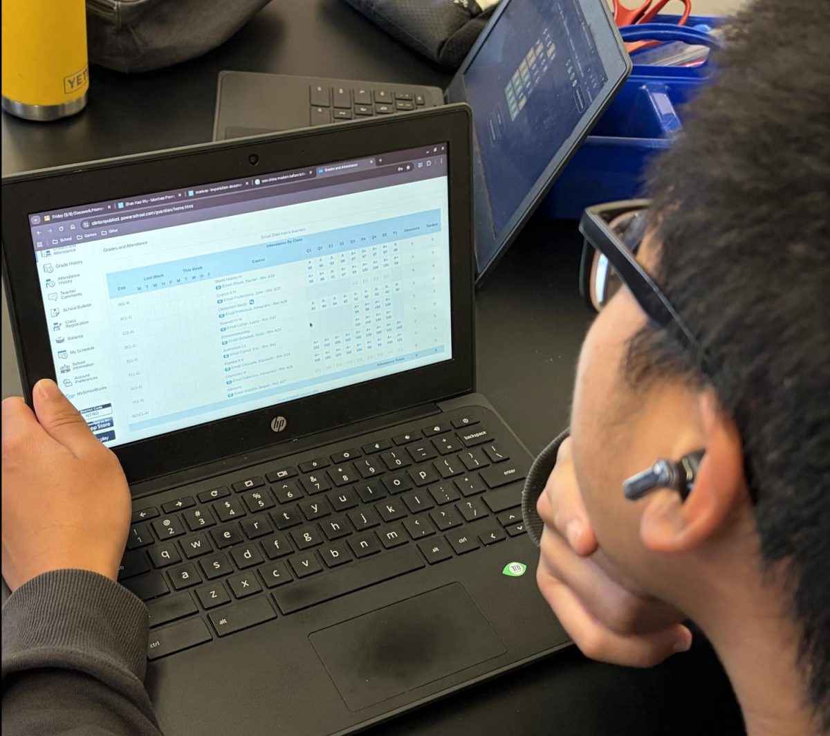A student at The Morgan School checking their grades on PowerSchool.