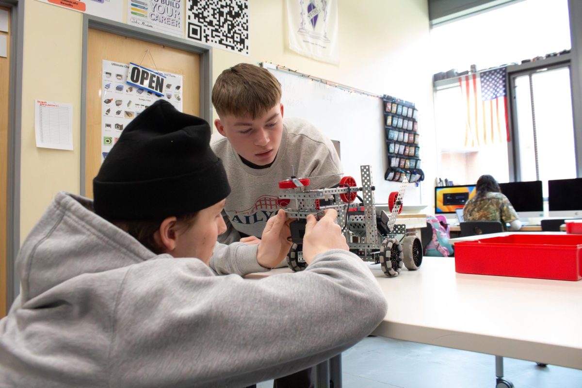 Morgan students working on a robot in DiStefano's robotics class. 