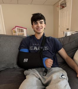 Jack Henry Palazzo post surgery recovering while on the couch 